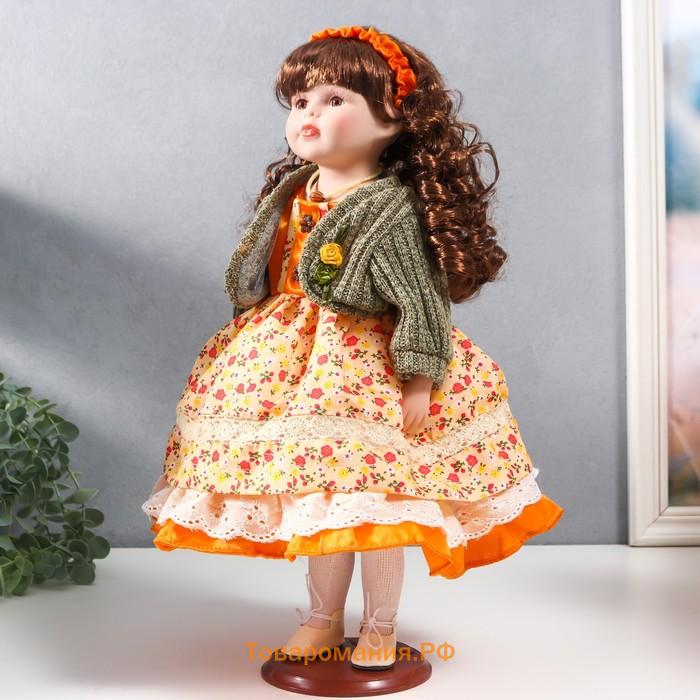 Кукла коллекционная керамика "Вера в платье с мелкими цветами и зелёном джемпере" 40 см